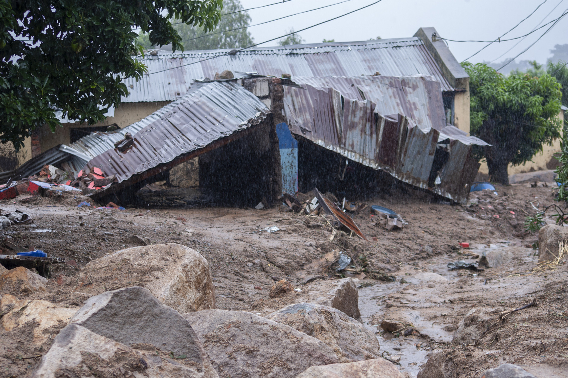  A general view of a collapsed structure in Blantyre on March 14, 2023, caused by heavy rains following cyclone Freddy's landfall. - Cyclone Freddy, packing powerful winds and torrential rain, killed more than 100 people in Malawi and Mozambique on its return to southern Africa's mainland, authorities said on March 13, 2023.
Freddy, on track to become the longest-lasting storm on record, barrelled through southern Africa at the weekend for the second time within a few weeks, making a comeback after a first hit in late February. (Photo by Amos GUMULIRA / AFP)