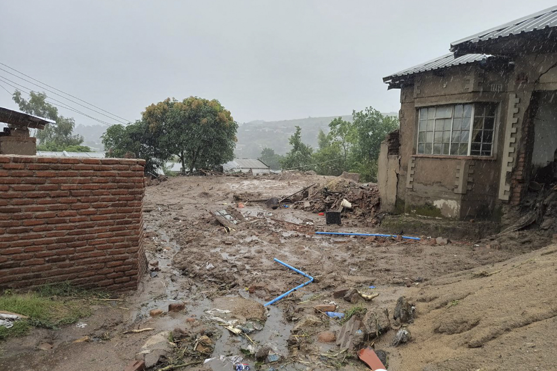  A general view of a damaged house caused by flood water in Chimkwankhunda in Blantyre on March 14, 2023, caused by heavy rains following cyclone Freddy's landfall. - Cyclone Freddy, packing powerful winds and torrential rain, killed more than 100 people in Malawi and Mozambique on its return to southern Africa's mainland, authorities said on March 13, 2023.
Freddy, on track to become the longest-lasting storm on record, barrelled through southern Africa at the weekend for the second time within a few weeks, making a comeback after a first hit in late February. (Photo by Jack McBrams / AFP)