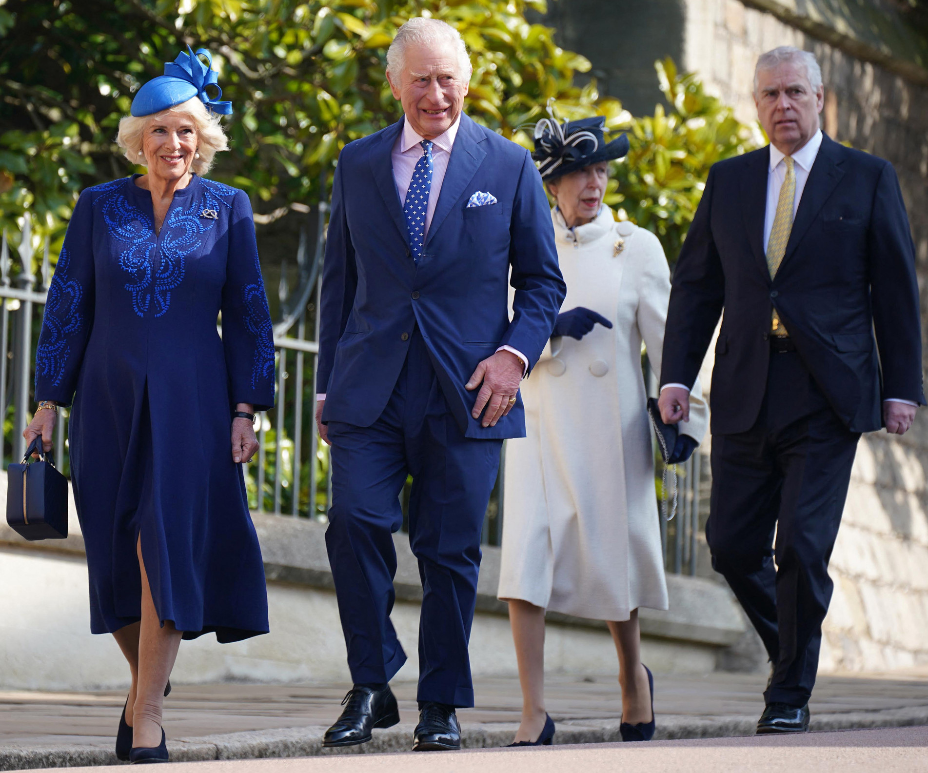  Britain's King Charles III (2L) and Britain's Camilla, Queen Consort (L) walk with Britain's Princess Anne, Princess Royal (2R), and Britain's Prince Andrew, Duke of York as they arrive for the Easter Mattins Service at St. George's Chapel, Windsor Castle on April 9, 2023. (Photo by Yui Mok / POOL / AFP)